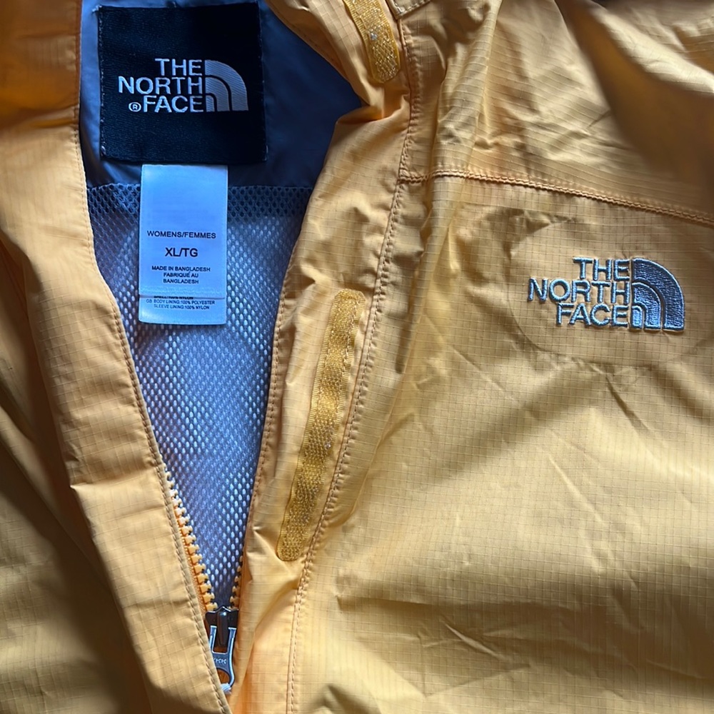 The North Face waterproof yellow women’s jacket XL